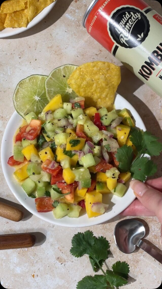 looking for a delicious but light recipe for super bowl sunday that your friends will love? this mango cucumber salsa is guarenteed to be the star of the show✨ details below:

Ingredients for the Salsa:

1 large ripe mango, diced
1 cup cucumber, diced (peeled if desired)
1 small red bell pepper, diced
¼ cup red onion, finely chopped
1 small jalapeño, finely diced (seeds removed for less heat)
2 tbsp fresh cilantro, chopped
1 small avocado, diced (optional, added before serving)

Ingredients for the Kombucha Dressing:

1 tbsp Liquid Remedy Mango Passion Kombucha
1 tbsp olive oil
1 tsp lime juice
1 tbsp agave syrup or (vegan) honey
3 tbsp dijon mustard
½ tsp chili powder or smoked paprika
Salt and pepper to taste

Instructions:

In a small bowl or jar, whisk together the kombucha, olive oil, lime juice, honey or agave, mustard and chili or paprika powder. Season with salt and pepper to taste.

In a medium bowl, combine the diced mango, cucumber, red bell pepper, red onion, cilantro, and jalapeño. Set aside.

If needed drain any excess liquids from the salsa. Then pour the kombucha dressing over the salsa and toss gently to coat everything evenly.

Cover and refrigerate for 15-20 minutes to let the flavors meld together. Add avocado just before serving if using.

Serve with tortilla chips, as a taco topping, or with grilled protein of choice!